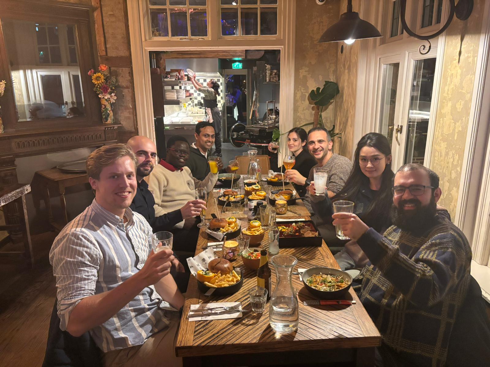 A picture at a restaurant with the PRISMA team.